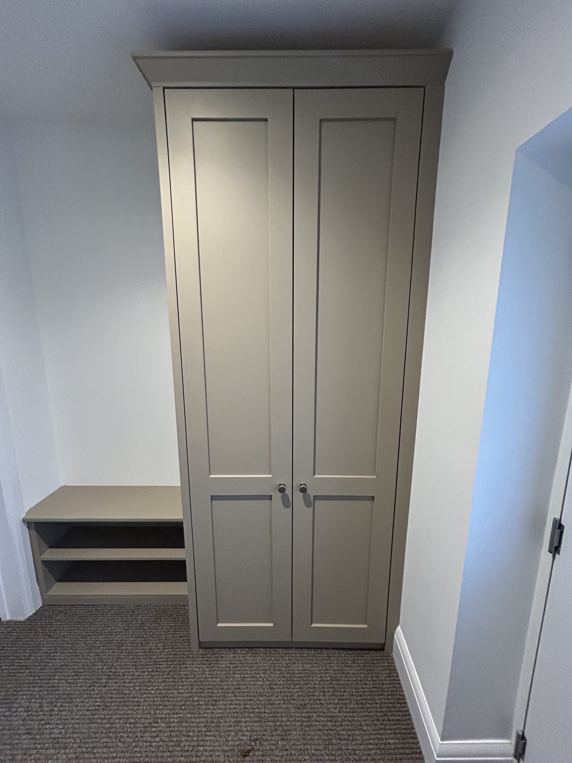Bespoke built-in coat cupboard with shaker styling in a hallway, Maidenhead