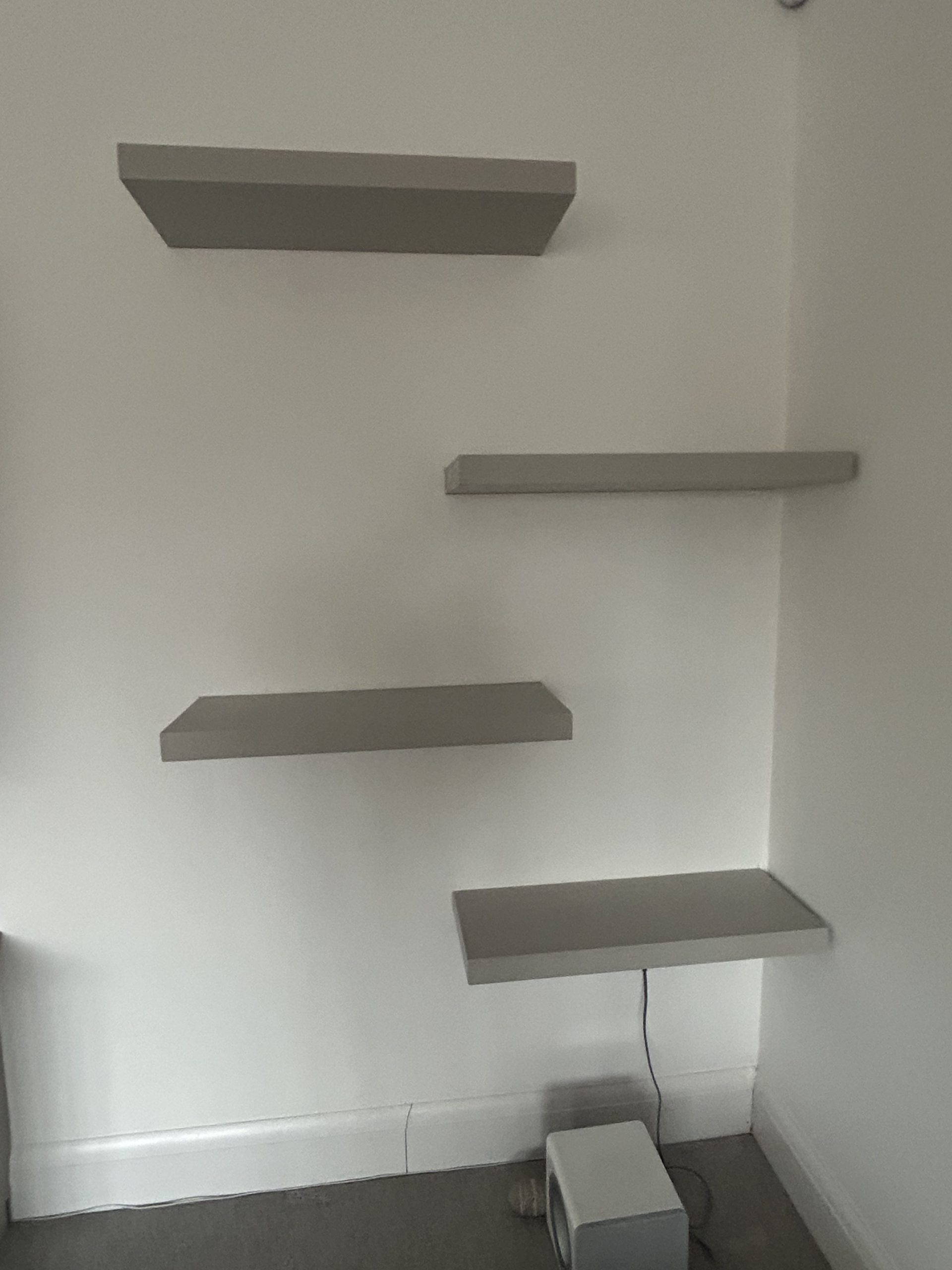 Bespoke floating shelves in solid timber with concealed brackets, Reading